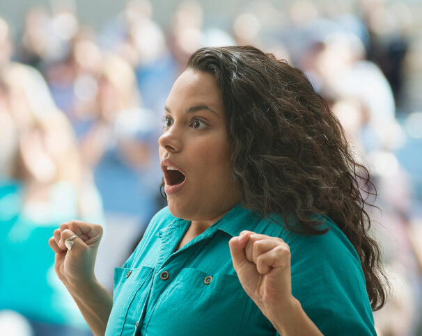 Shocked female spectator - anticipation for consistent content